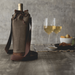 Legacy Barware Waxed Canvas Wine Tote - tote on table with wine glasses behind