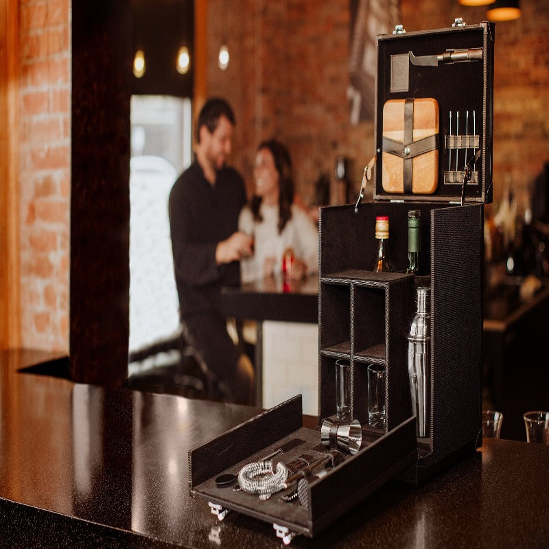 Legacy Hamilton Portable Cocktail Bar - case on top of counter in a bar