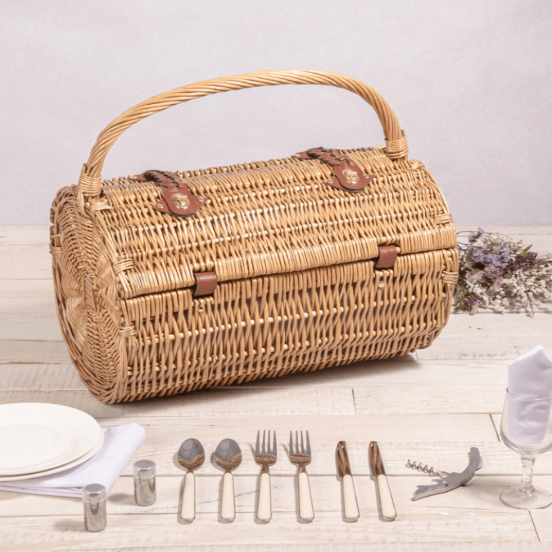 Picnic Time Barrel Picnic Basket - Closed View of  Picnic Basket with Utensils around it