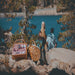 Picnic Time Barrel Picnic Basket - Two Picnic Baskets  On a Rock by a Lake