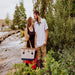 Picnic Time Boardwalk Picnic Basket for 4 - Beige - man and woman outside carrying basket