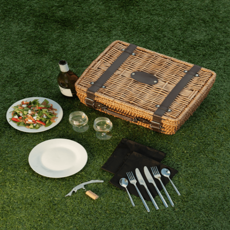 Picnic Time Champion Picnic Basket - Black with Brown Accents - Top view of the Picnic Basket outside on Grass