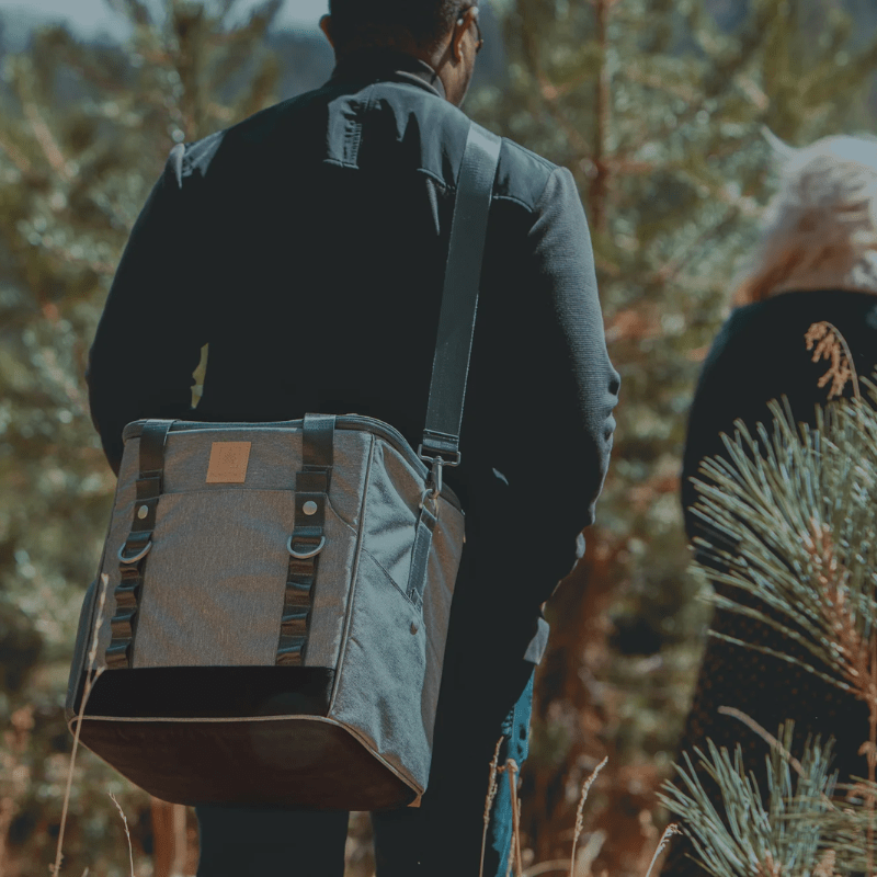 Picnic Time Frontier Picnic Utility Cooler - Man carrying cooler on his back, very light to carry