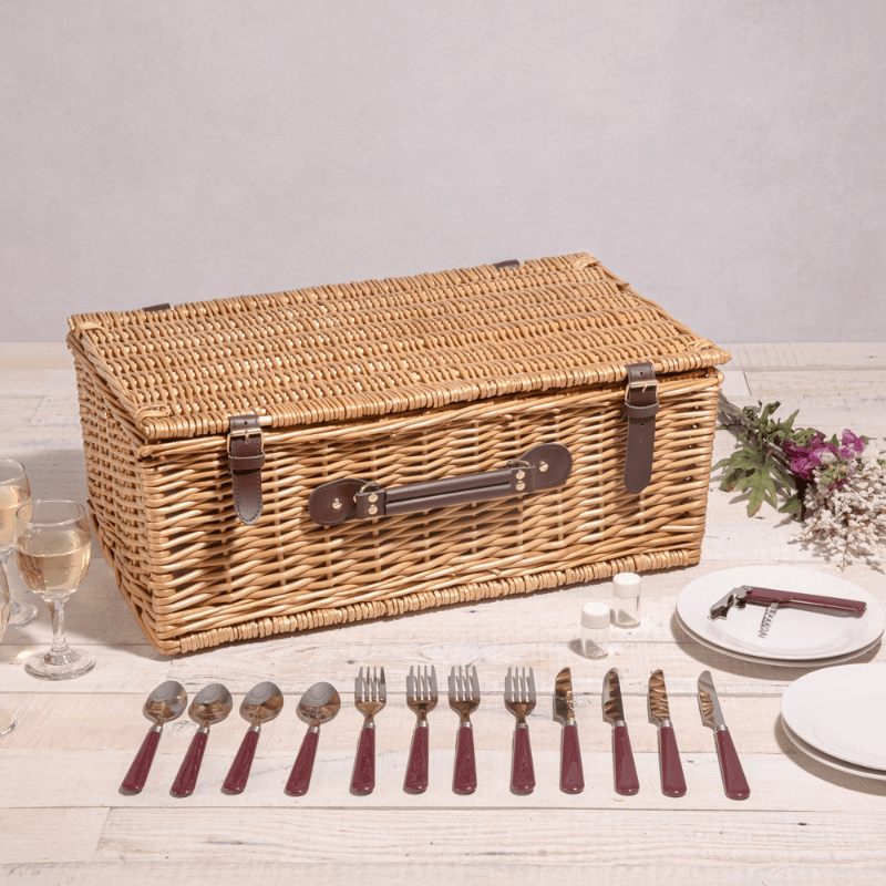 Picnic Time Newbury Picnic Basket - Navy Blue & Burgundy Plaid Pattern - Closed view of picnic basket with utensils beside