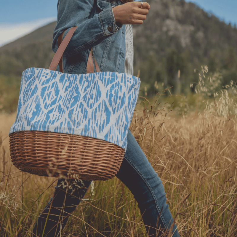 Picnic Time Promenade Picnic Basket - Moroccan Watercolor Pattern - Women using the picnic basket outdoors