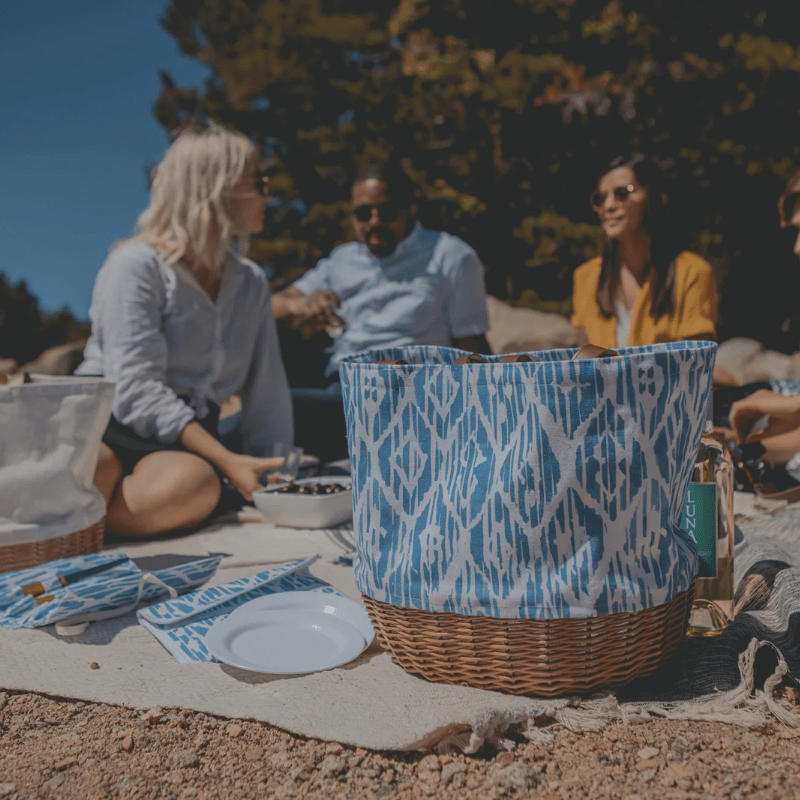 Picnic Time Promenade Picnic Basket - Moroccan Watercolor Pattern - Women and man using the picnic basket