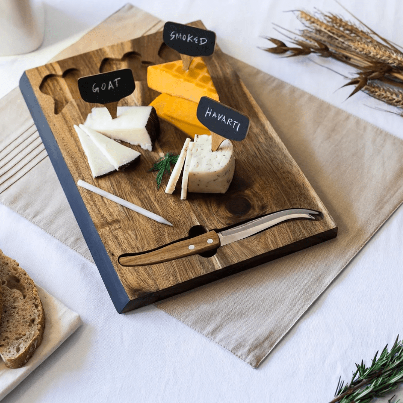 Toscana Delio Acacia Cheese Cutting Board & Tools Set - markers with cheese names written in chalk